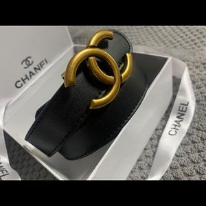 Black belt with gold tone hardware, fits a L/XL